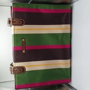 Kate Spade stripped purse with leather straps.